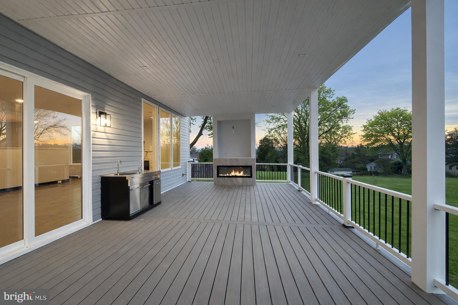 2613 Beacon Hill Road Alexandria, VA 22306 - Photo 20 of 65 Spacious deck with serene sunset views.