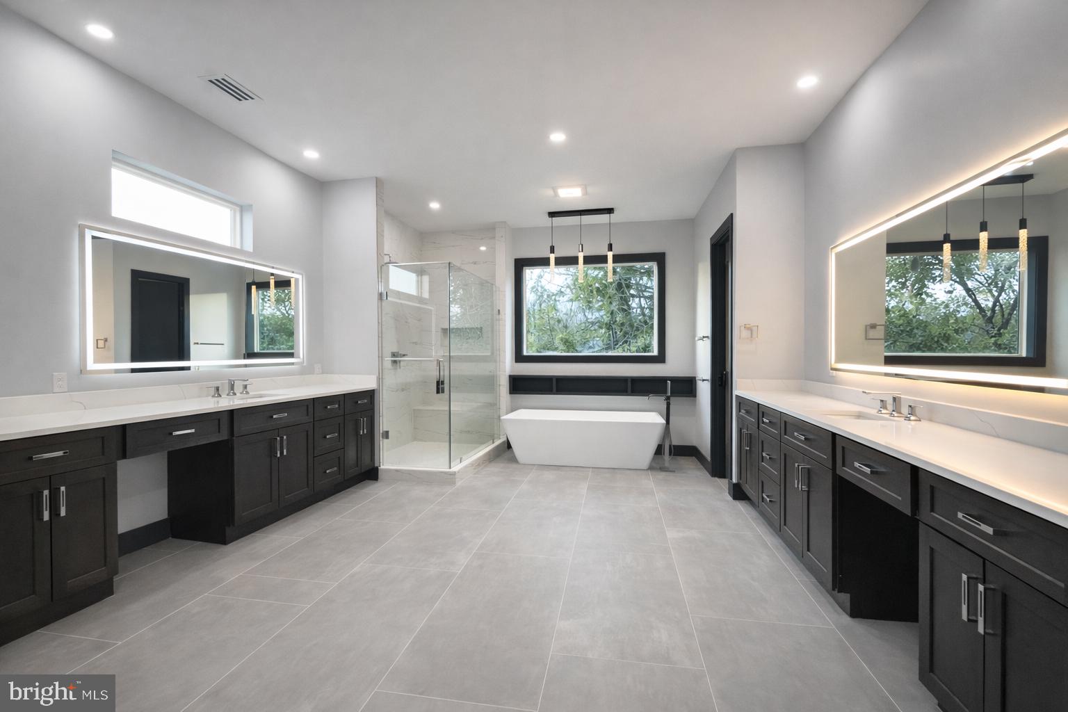 2613 Beacon Hill Road Alexandria, VA 22306 - Photo 29 of 65 Sleek modern bathroom with natural light.
