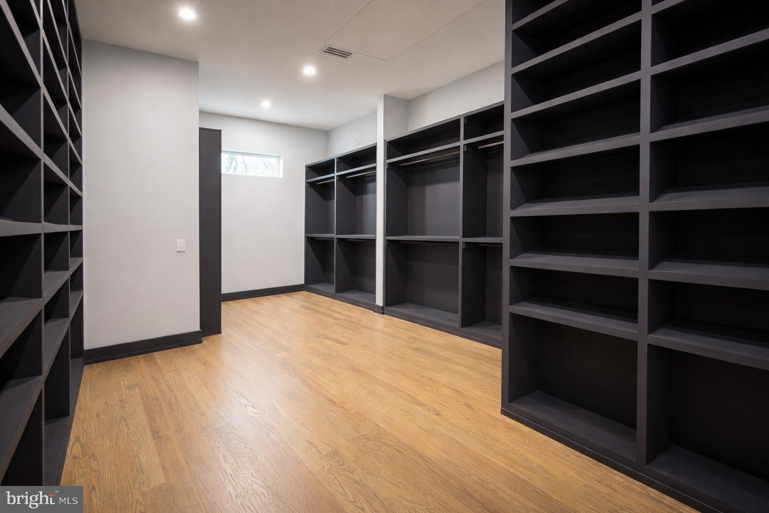 2613 Beacon Hill Road Alexandria, VA 22306 - Photo 33 of 65 Spacious, modern closet with sleek shelves.