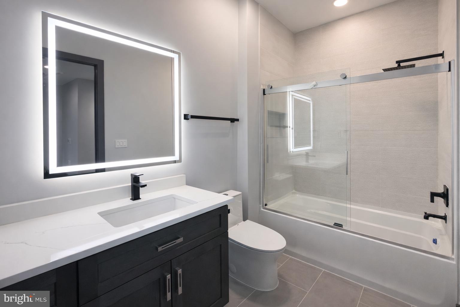 2613 Beacon Hill Road Alexandria, VA 22306 - Photo 38 of 65 Sleek modern bathroom with elegant finishes.
