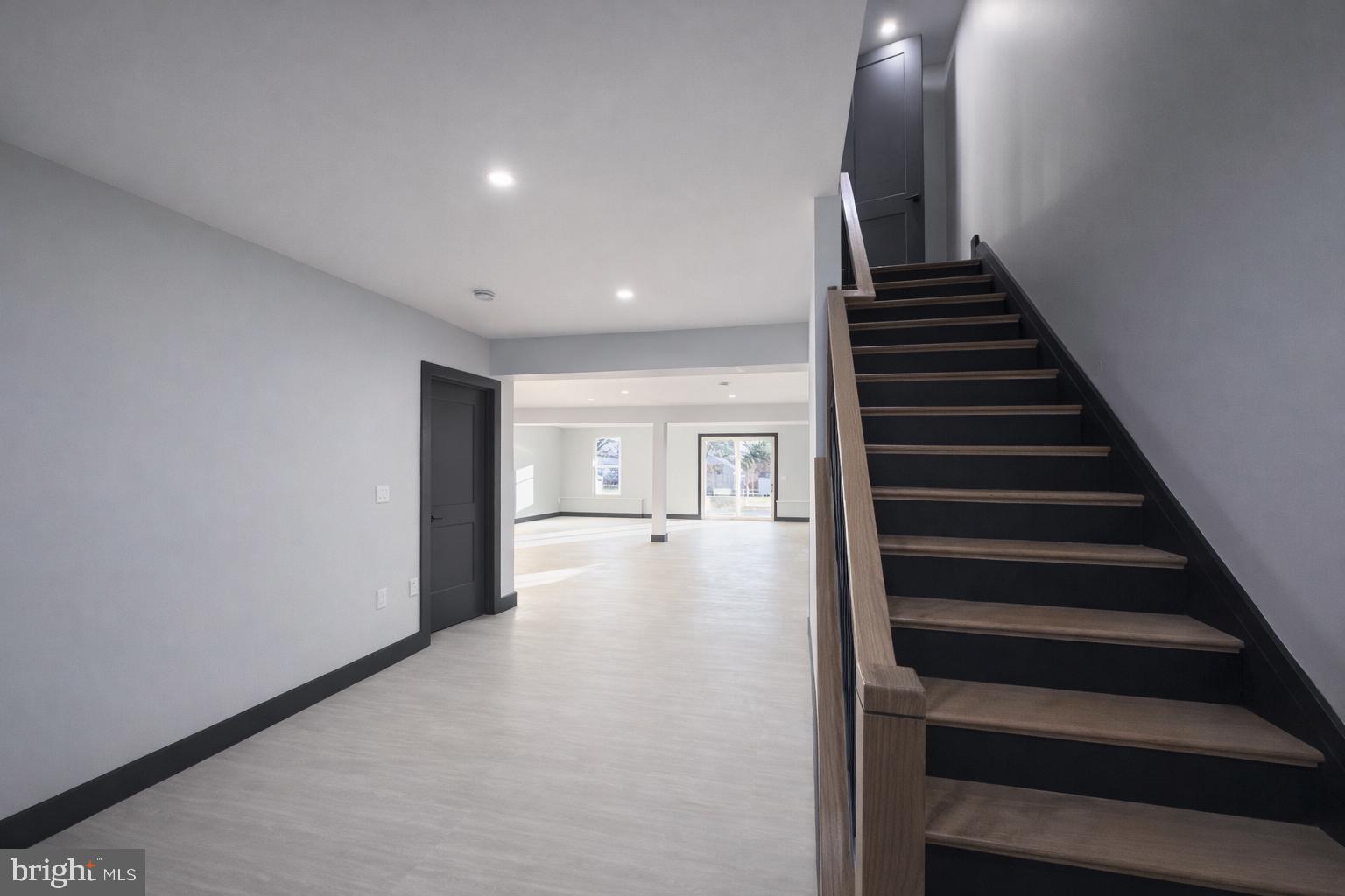 2613 Beacon Hill Road Alexandria, VA 22306 - Photo 51 of 65 Modern entryway with stylish staircase.