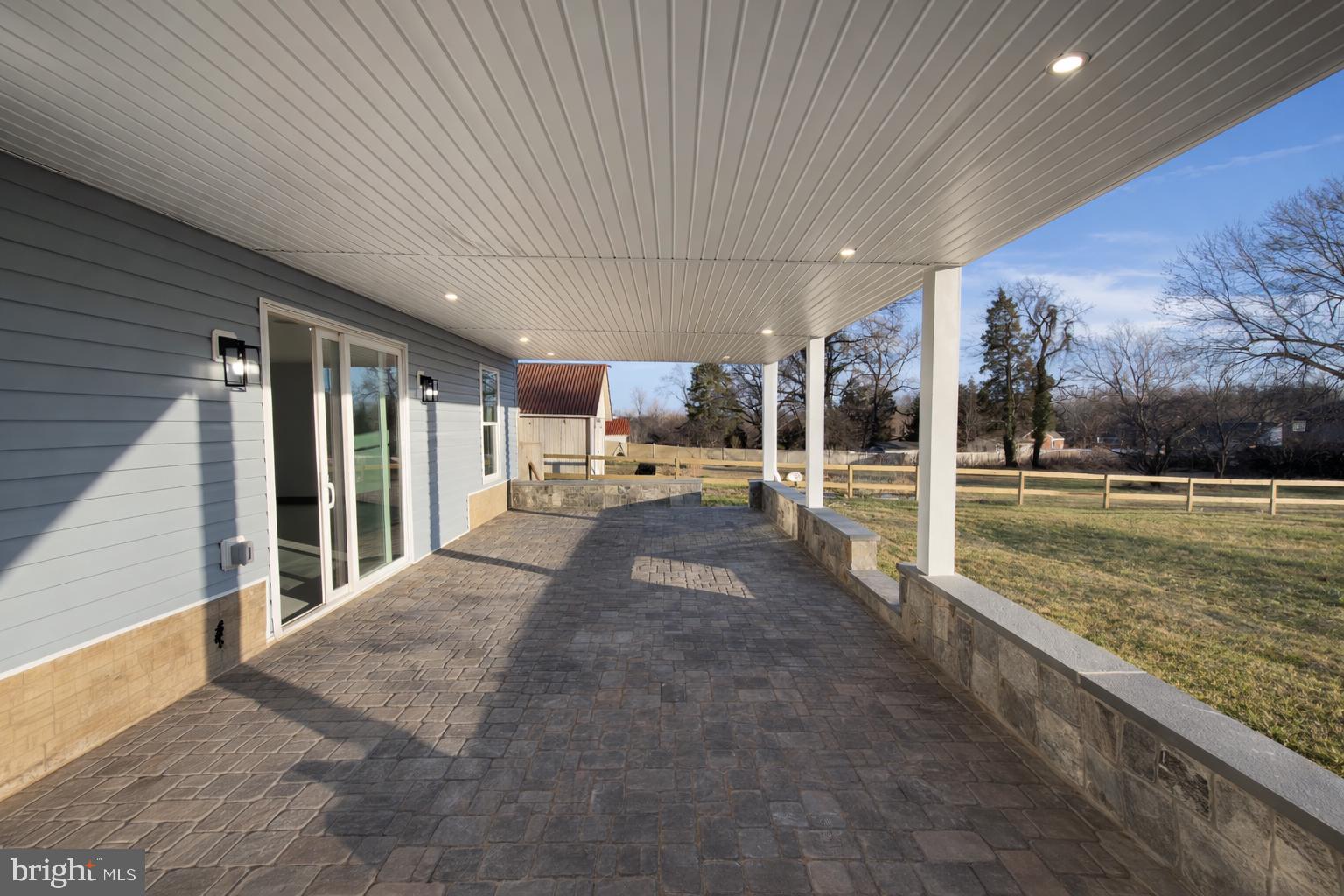 2613 Beacon Hill Road Alexandria, VA 22306 - Photo 55 of 65 Spacious patio with serene views.