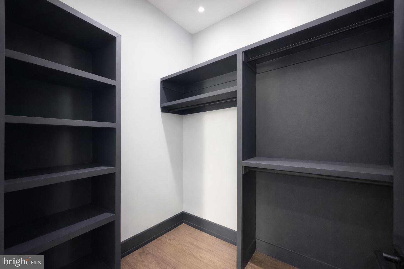 2613 Beacon Hill Road Alexandria, VA 22306 - Photo 10 of 65 Sleek, modern closet with ample space.