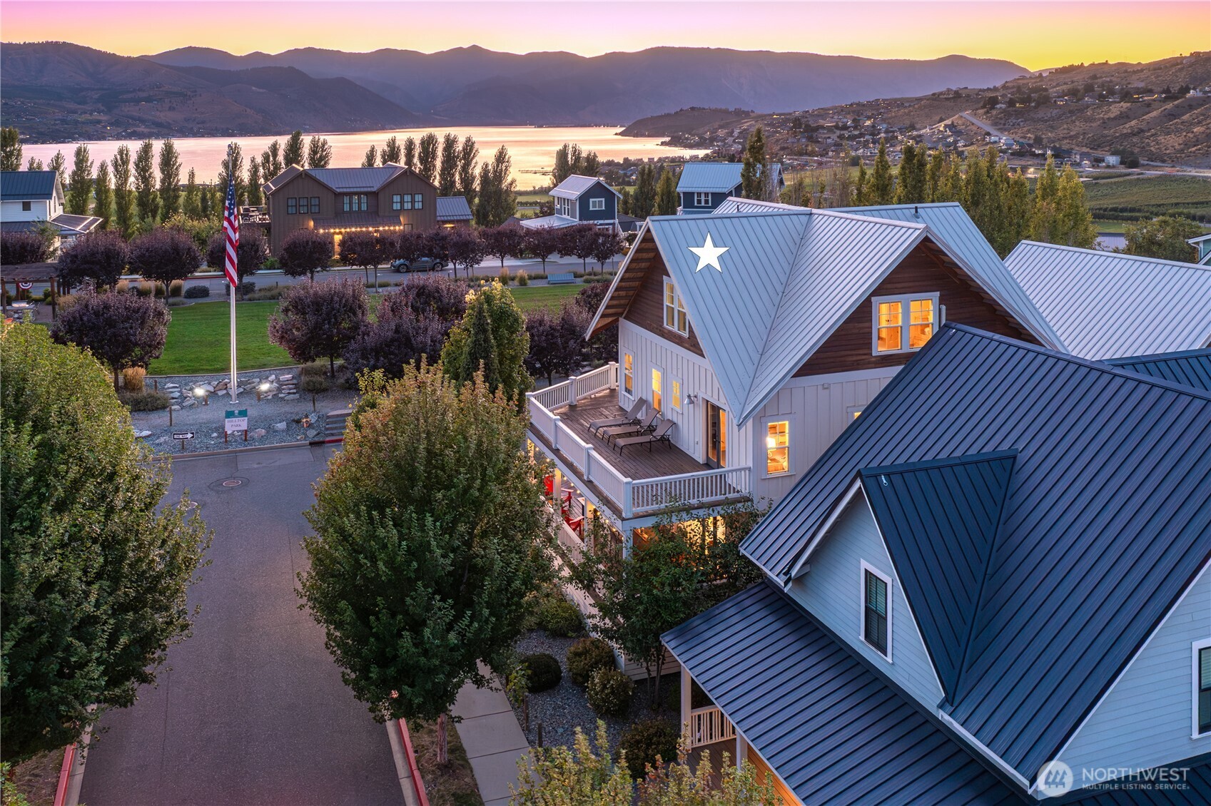 108 Jackrabbit Lane Chelan, WA 98816 - Photo 2 of 40 a view of a houses with a city from a balcony