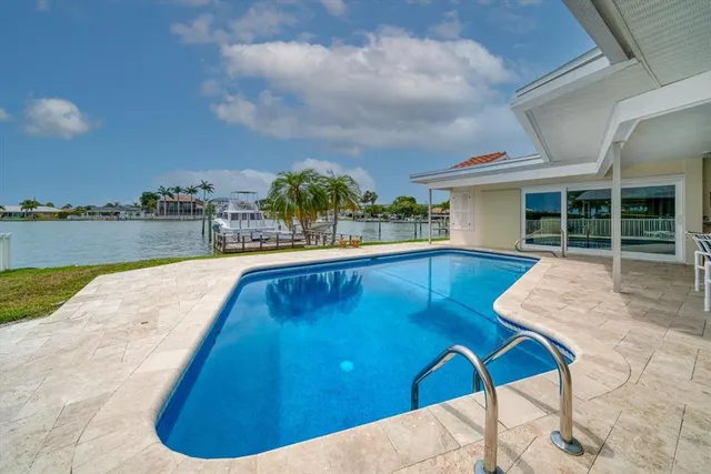 a view of a lake with houses with outdoor space