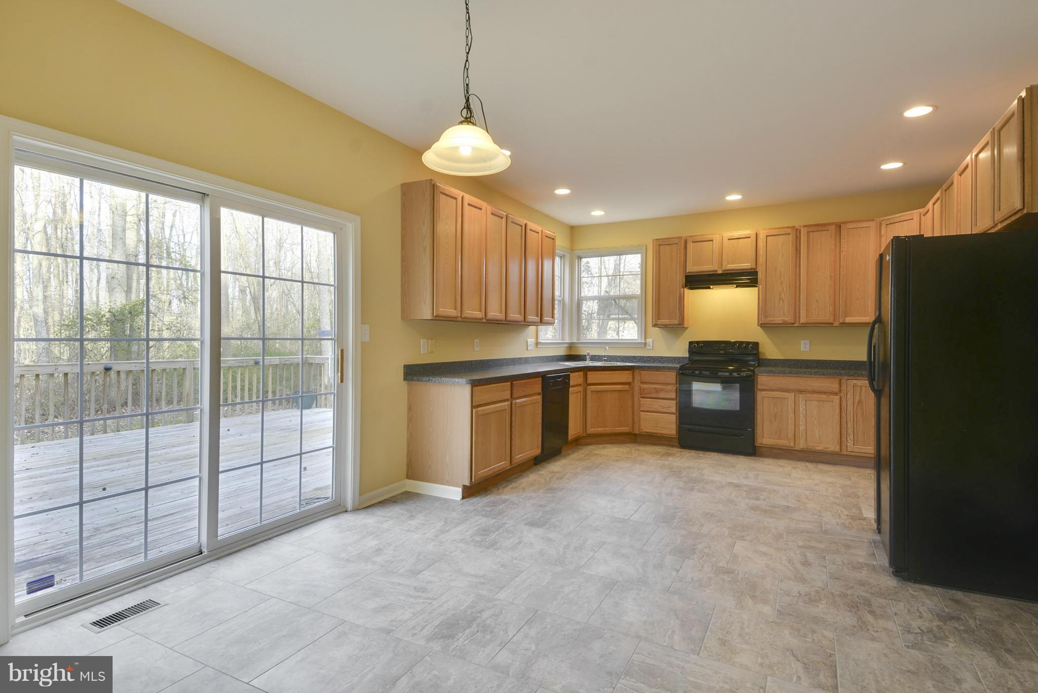 142 Collier Road Grasonville, MD 21638 - Photo 8 of 30 Eat in Kitchen w/ sliders to back deck