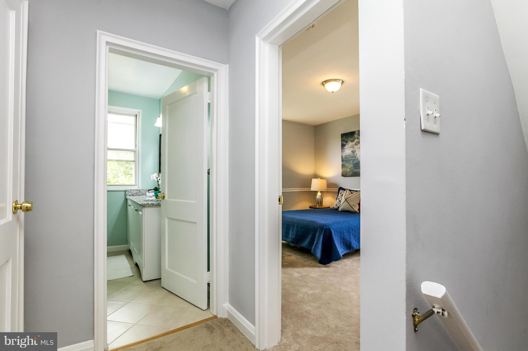 940 Masefield Road Baltimore, MD 21207 - Photo 12 of 28 a view of a bathroom from a en suite bathroom