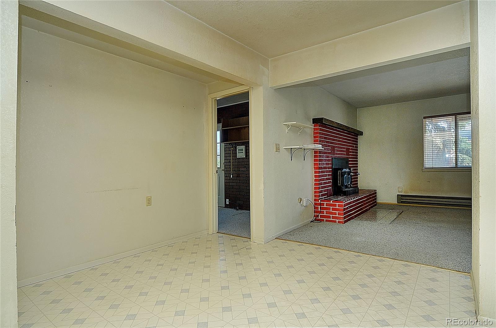 114 Loop Drive Howard, CO 81233 - Photo 12 of 24 an empty room with windows and closet