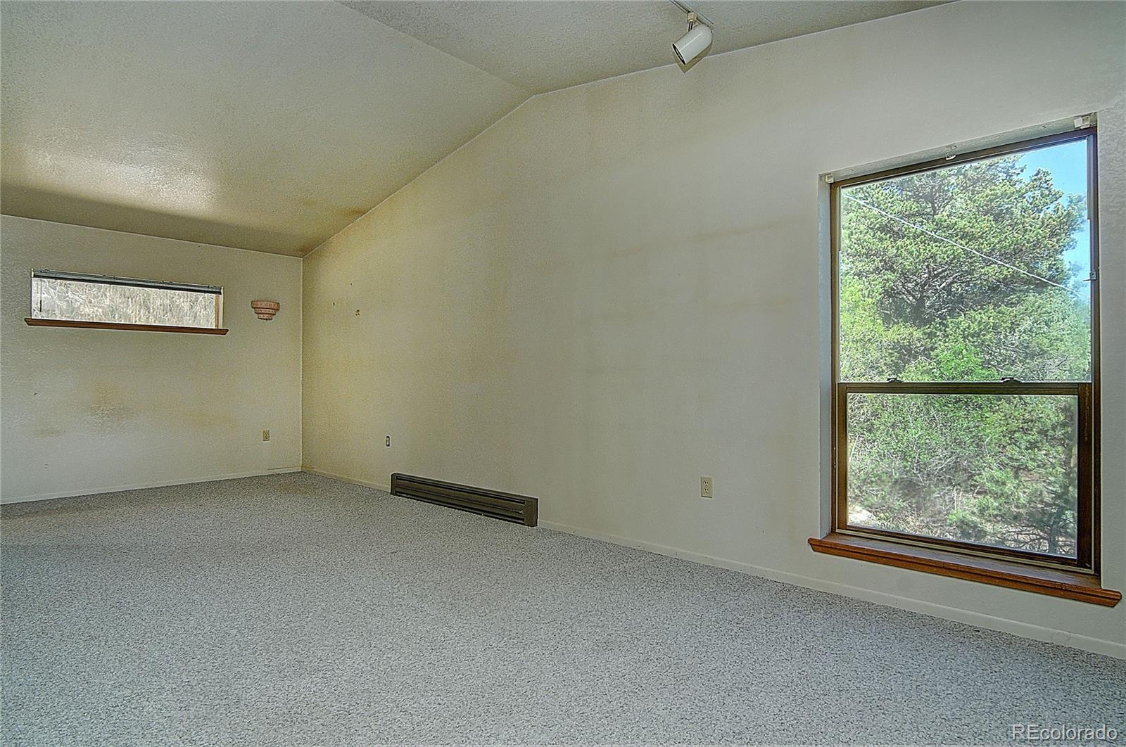 114 Loop Drive Howard, CO 81233 - Photo 15 of 24 an empty room with a window