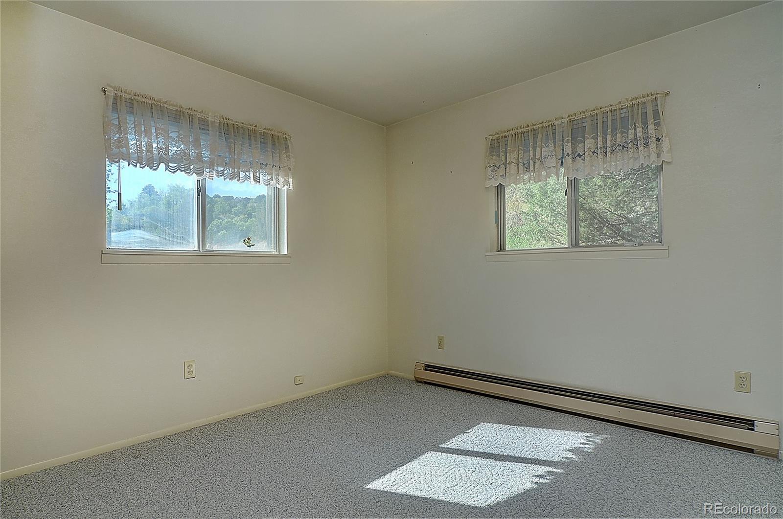 114 Loop Drive Howard, CO 81233 - Photo 20 of 24 an empty room with a window