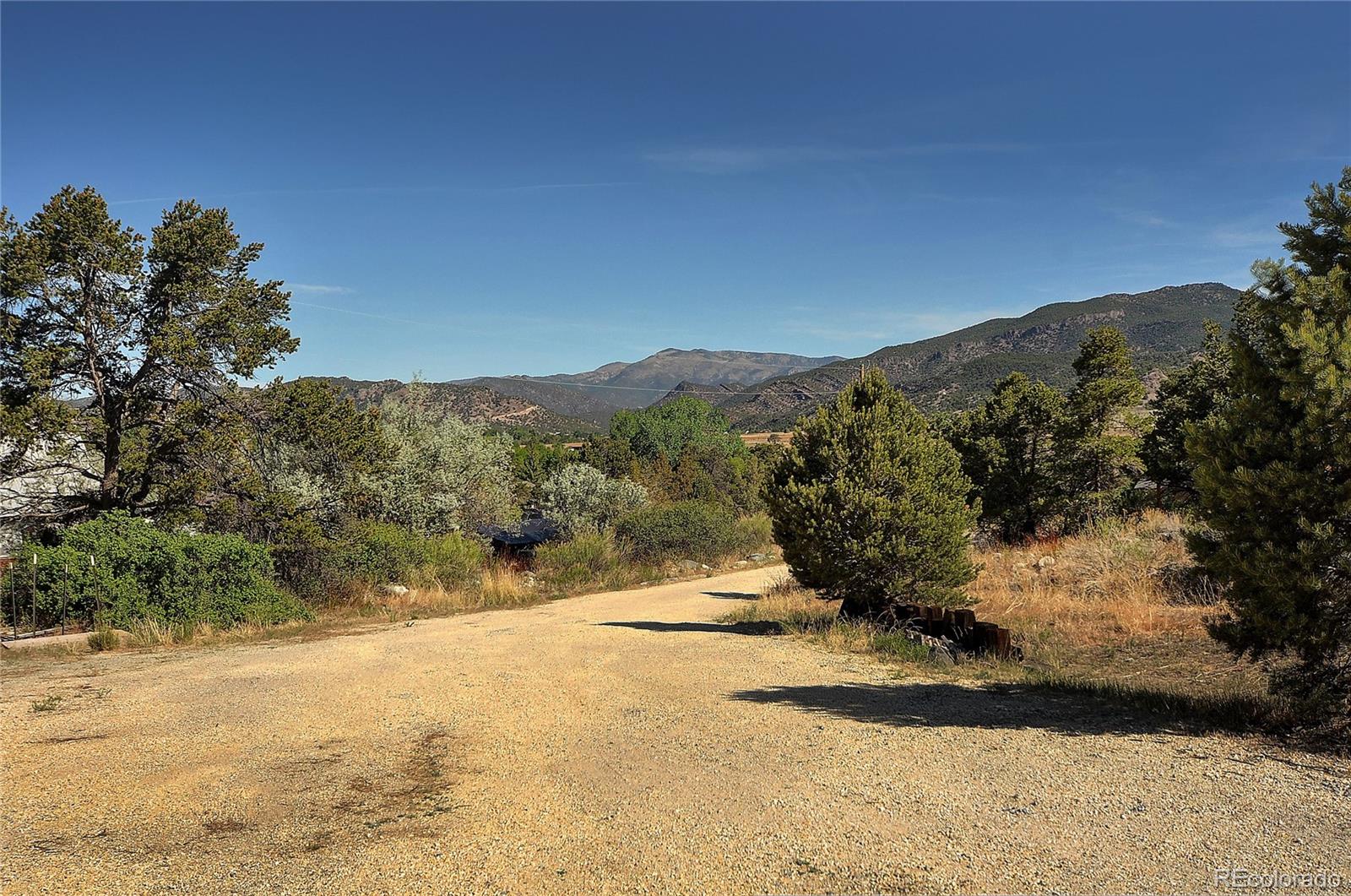 114 Loop Drive Howard, CO 81233 - Photo 24 of 24 a view of a yard with mountain