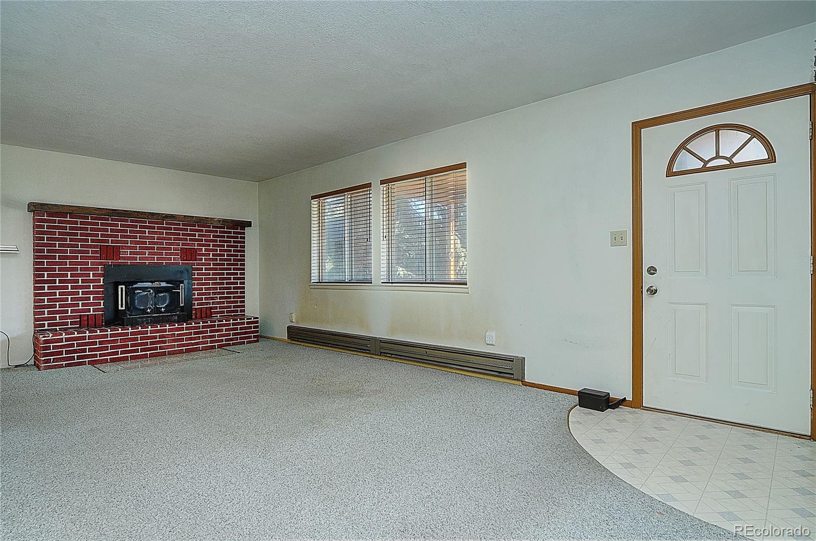 114 Loop Drive Howard, CO 81233 - Photo 7 of 24 an empty room with windows
