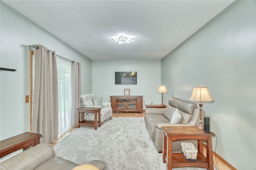 5907 Arbor Road Ontario, NY 14519 - Photo 10 of 50 Family Rm with sliding glass door to deck