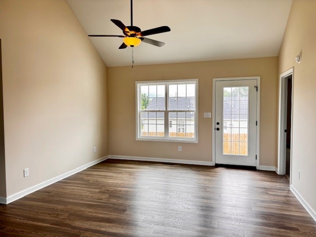 62 Modena Place Decherd, TN 37324 - Photo 3 of 14 an empty room with wooden floor and windows