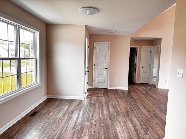 62 Modena Place Decherd, TN 37324 - Photo 5 of 14 a view of an empty room with wooden floor and a window