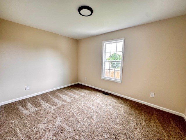 62 Modena Place Decherd, TN 37324 - Photo 10 of 14 an empty room with a window