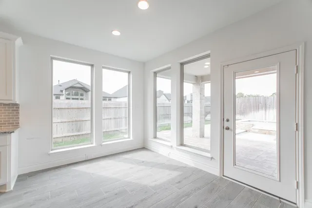 a view of an empty room and window
