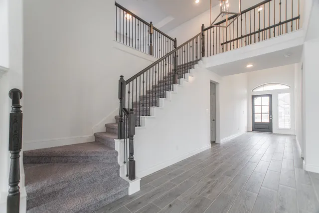 a view of entryway with wooden floor