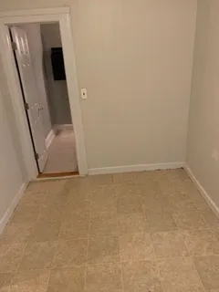 a bathroom with a tub and shower