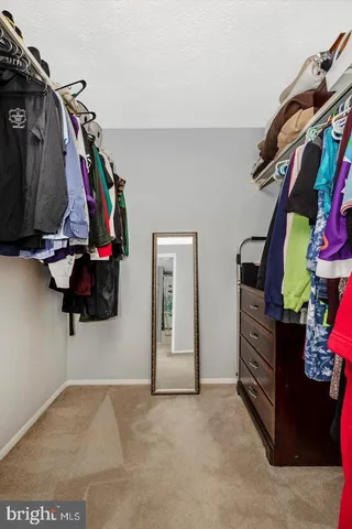 a workspace with furniture and a window