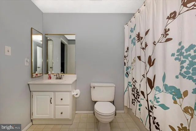 a room with furniture and a desk