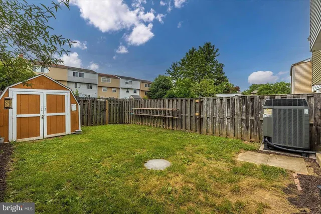 a view of an outdoor space and tennis court