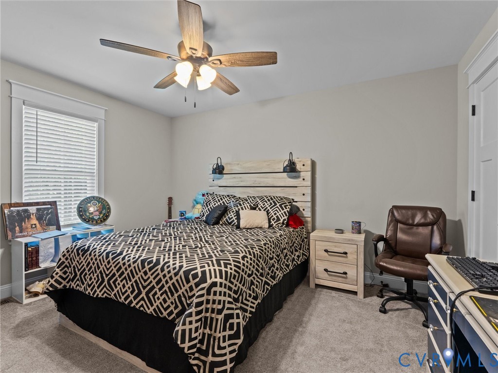10819 Vaughan Road Petersburg, VA 23805 - Photo 38 of 45 Carpeted room featuring a ceiling fan with integra