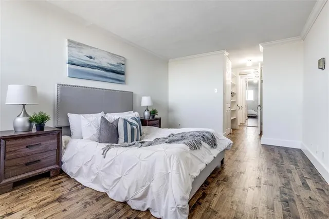 a bed room with a bed and a night lamp