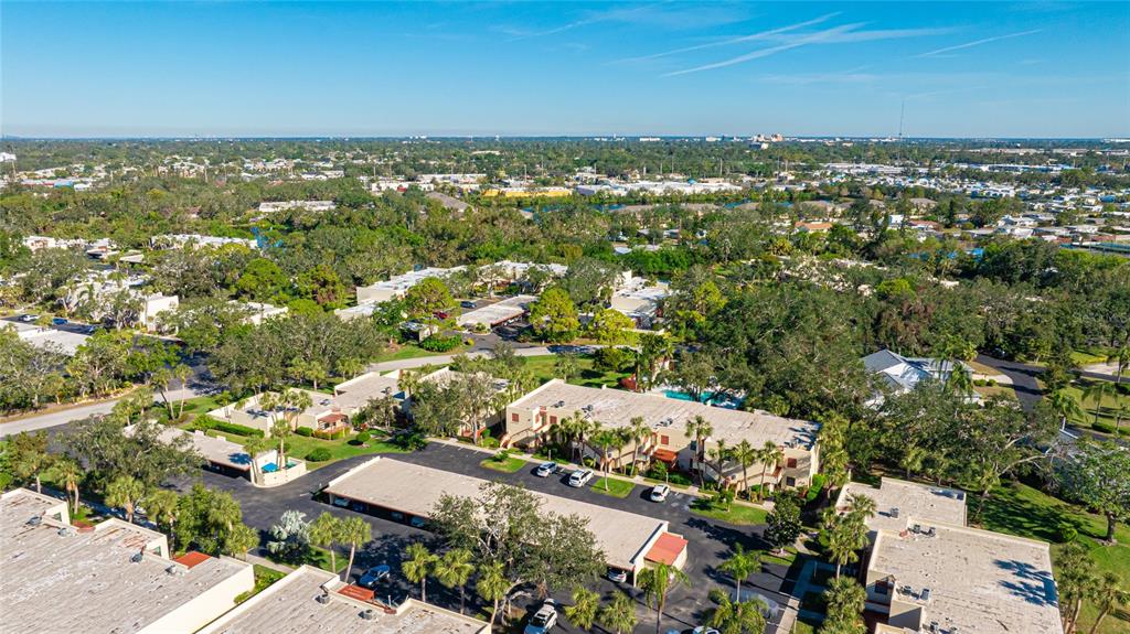 527 Spring Lakes Boulevard Bradenton, FL 34210 - Photo 25 of 41 an aerial view of residential houses with outdoor space