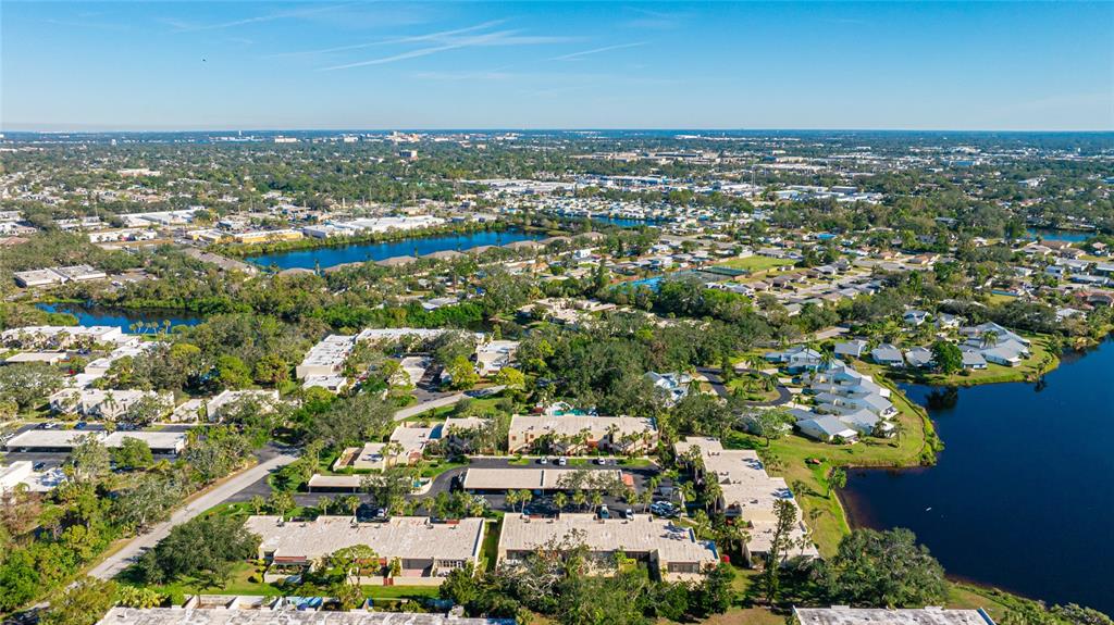 527 Spring Lakes Boulevard Bradenton, FL 34210 - Photo 27 of 41 an aerial view of residential houses with outdoor space and trees