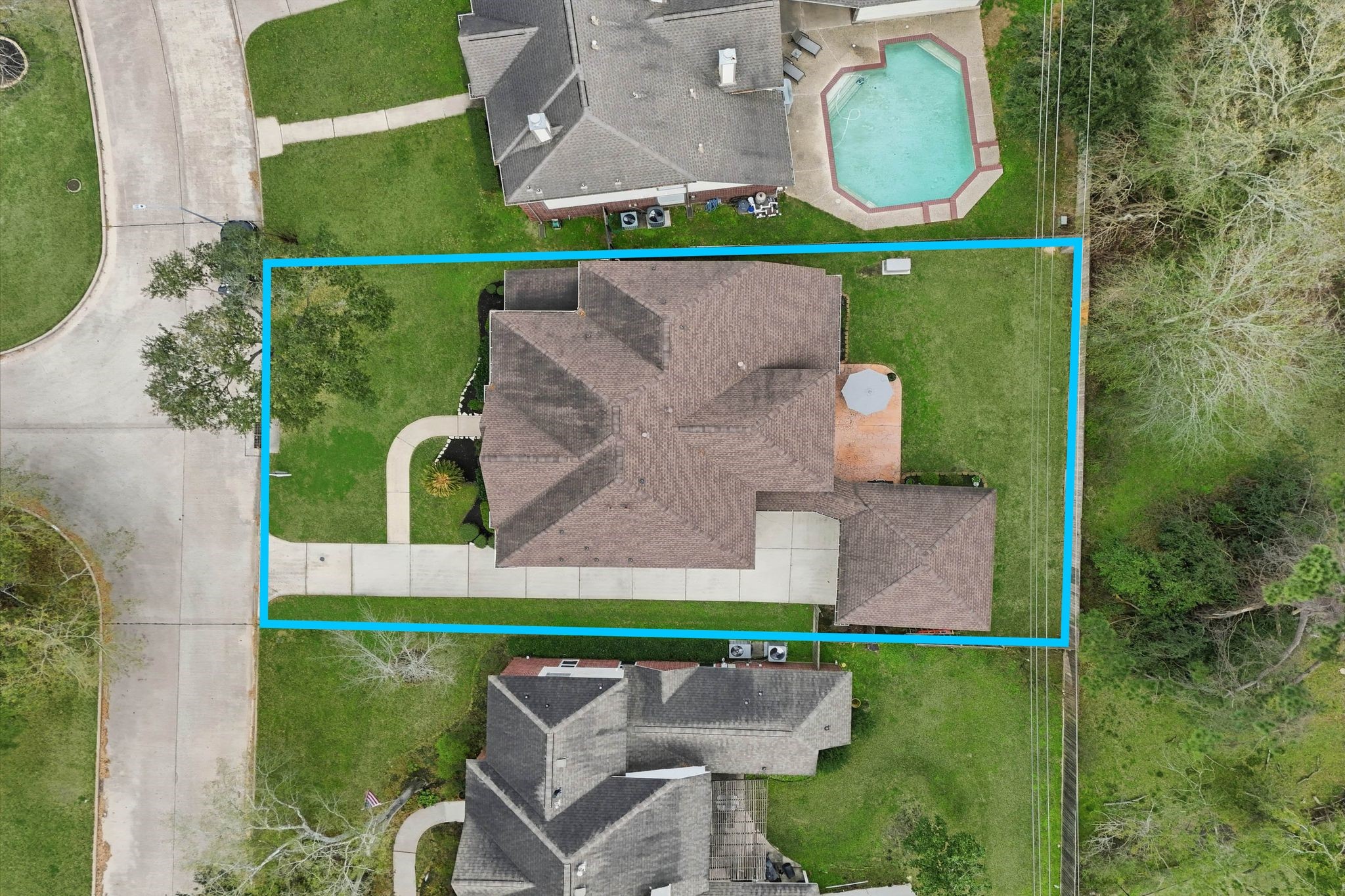 2515 Woodsboro Drive Spring, TX 77388 - Photo 41 of 44 This aerial photo shows the home with a well-maintained yard, a private driveway, and a spacious backyard with no back neighbors.