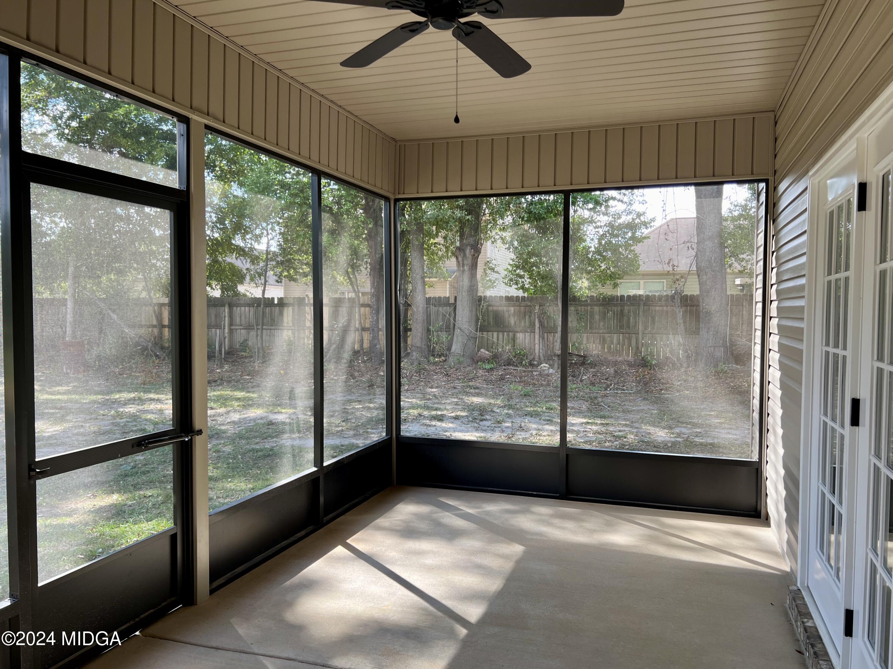 450 Walker Road Byron, GA 31008 - Photo 20 of 22 a view of a room with a ceiling fan and window