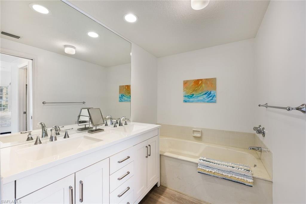 6030 Chardonnay Lane, Unit 203 Naples, FL 34119 - Photo 14 of 25 Separate tub and shower