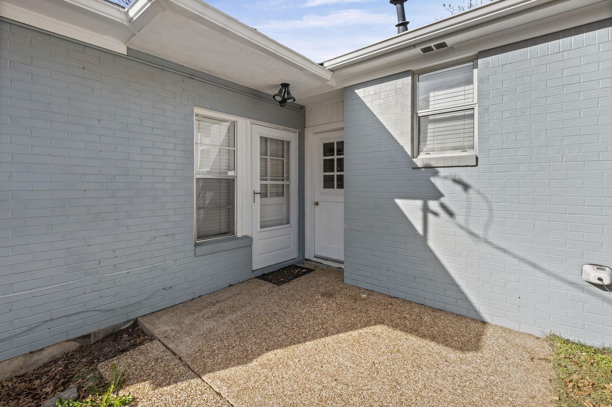 5037 Dee Road Memphis, TN 38117 - Photo 20 of 29 a view of a house with a wooden fence