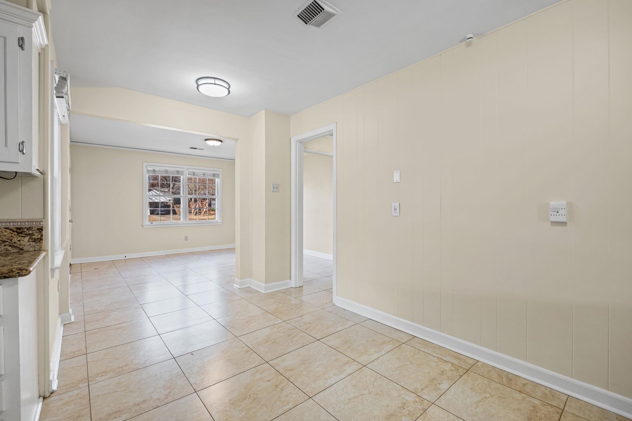 5037 Dee Road Memphis, TN 38117 - Photo 7 of 28 a view of an empty room with a window