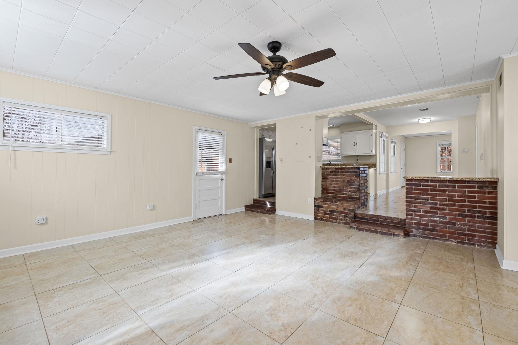 5037 Dee Road Memphis, TN 38117 - Photo 9 of 29 a view of empty room with a ceiling fan