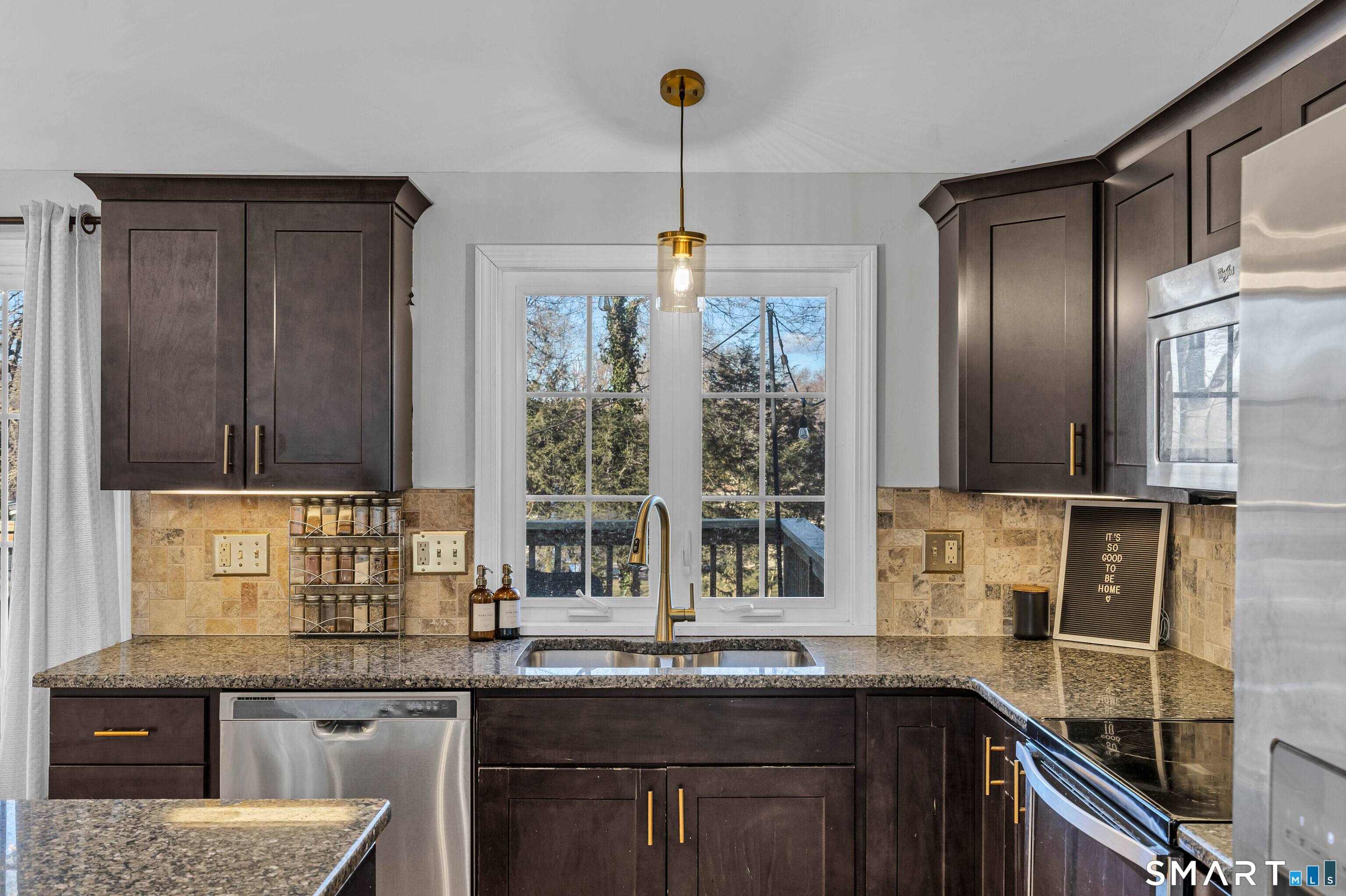 15 Country Club Drive Ledyard, CT 06339 - Photo 17 of 40 a kitchen with stainless steel appliances granite countertop a sink a stove and a cabinets