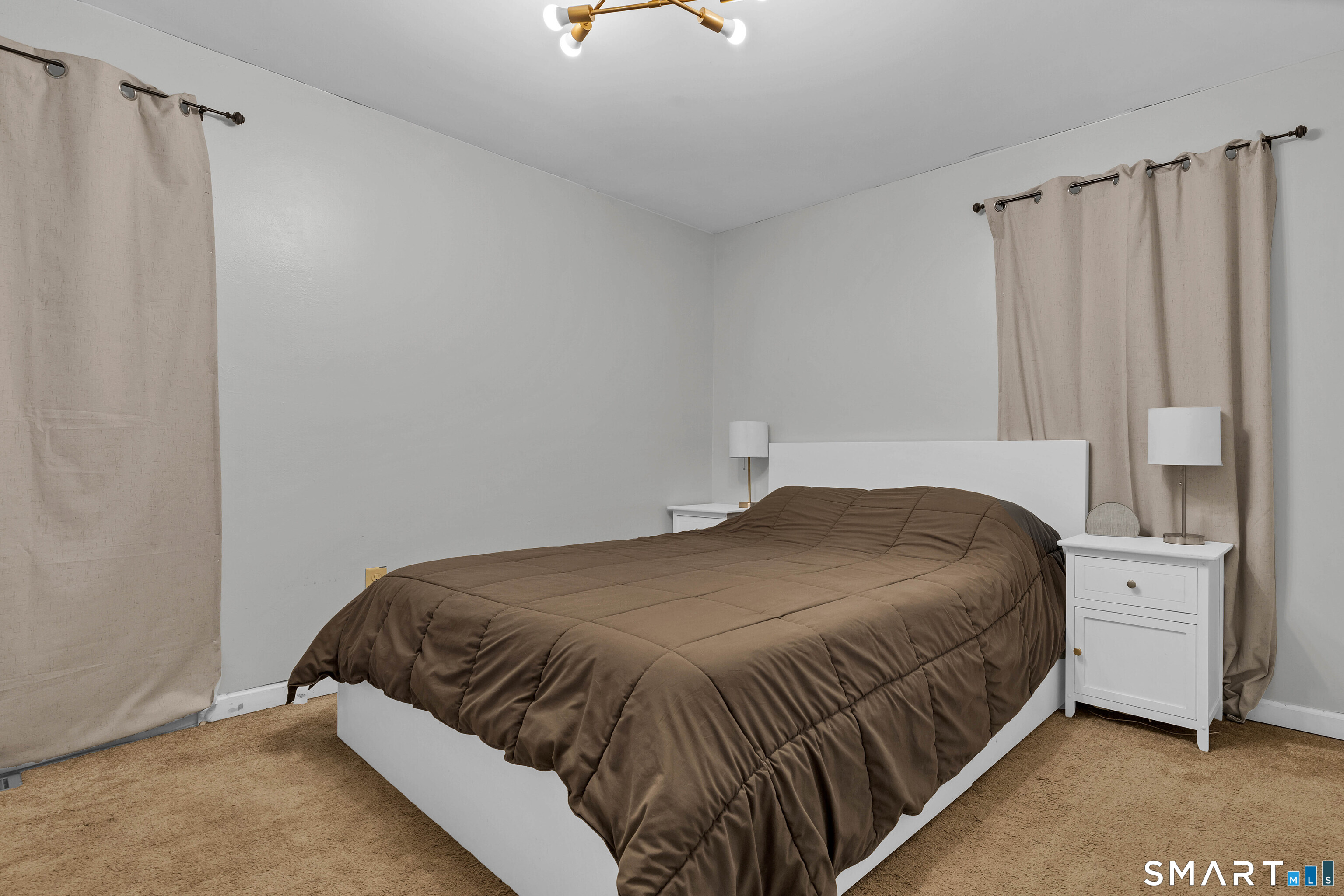 15 Country Club Drive Ledyard, CT 06339 - Photo 18 of 40 a bedroom with a bed and a window