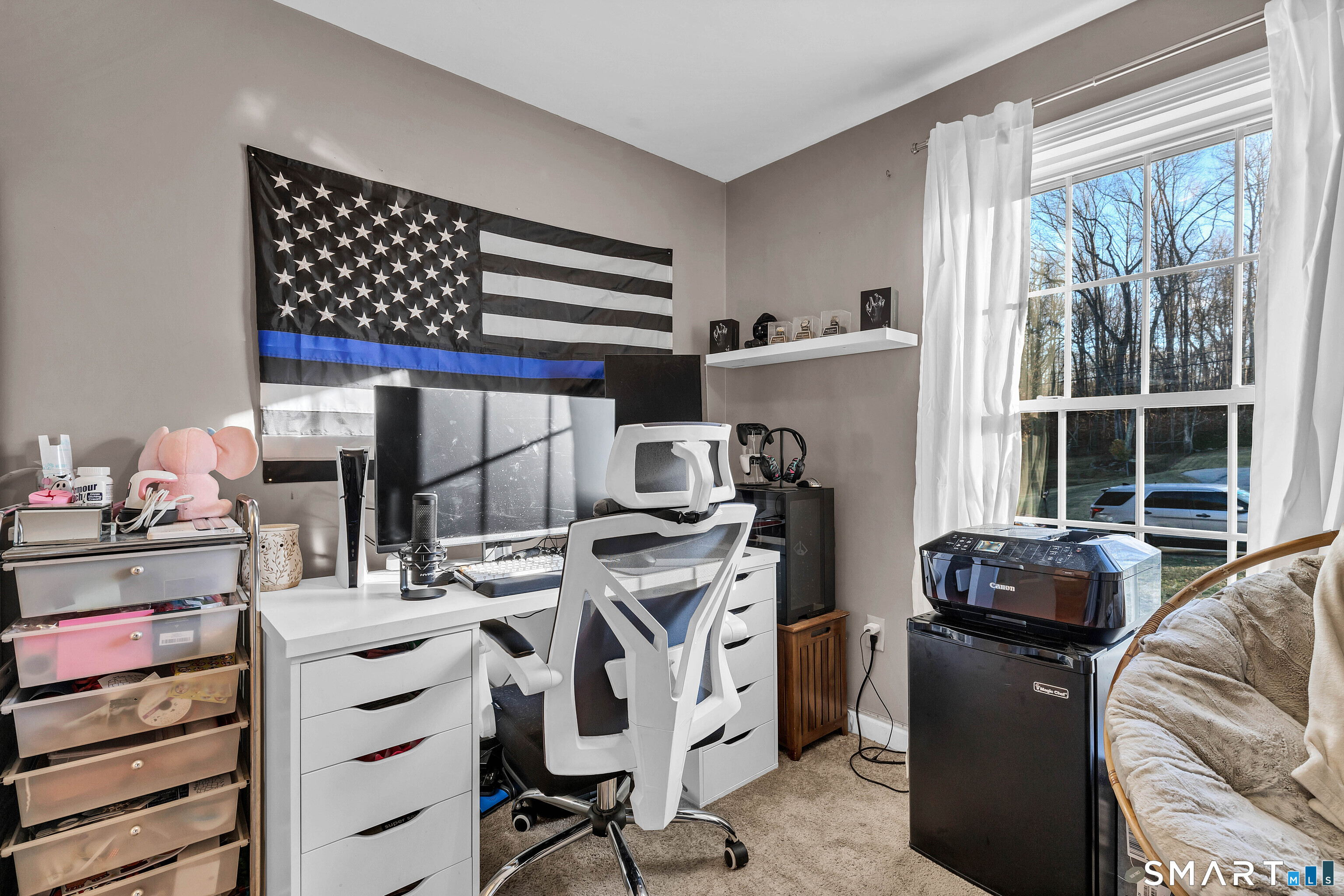 15 Country Club Drive Ledyard, CT 06339 - Photo 27 of 40 a view of a workspace with furniture and a window