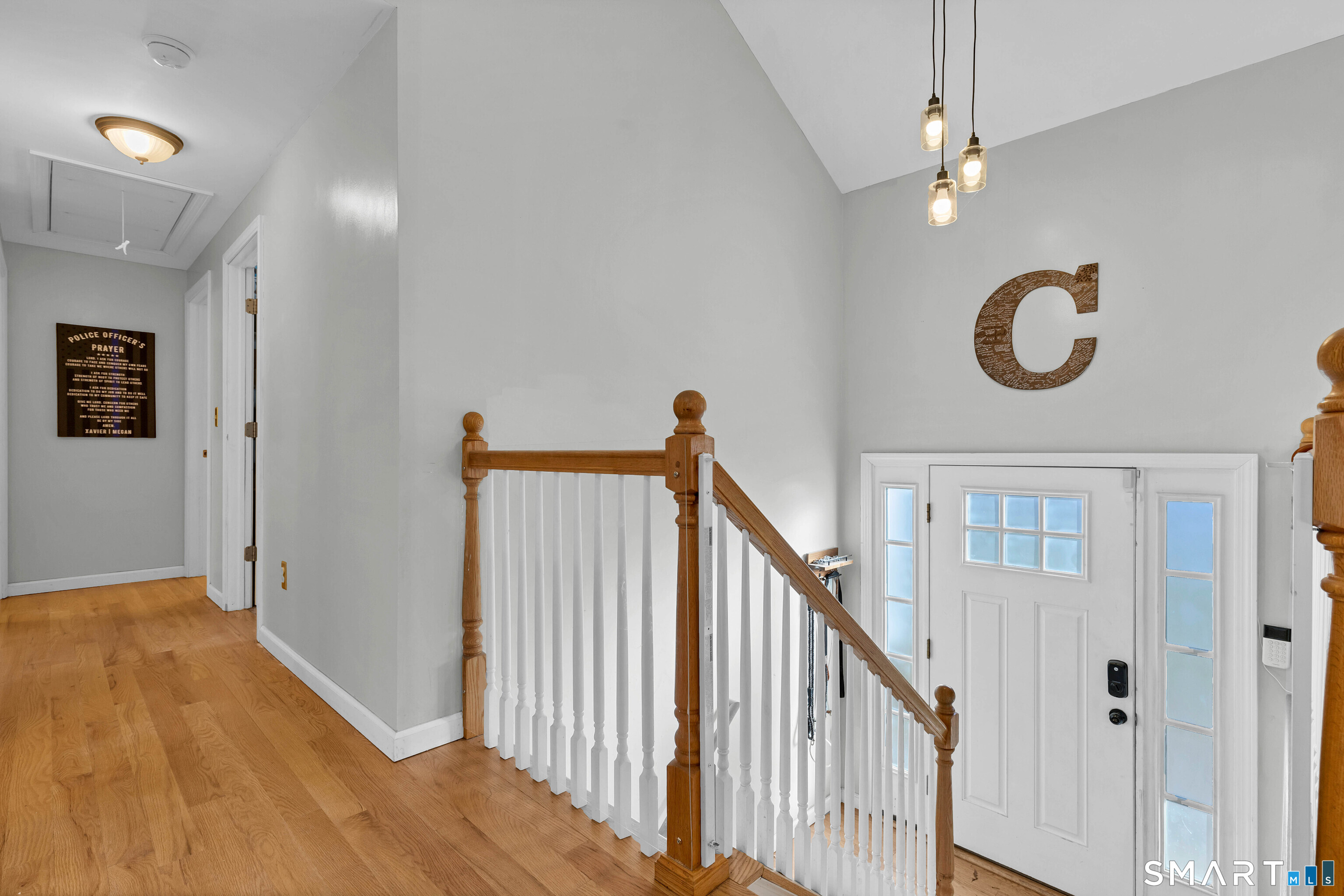 15 Country Club Drive Ledyard, CT 06339 - Photo 4 of 40 a view of a hallway with wooden floor and staircase