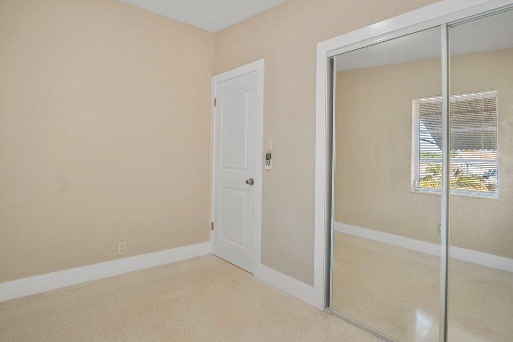 591 Oleander Road Lake Worth, FL 33462 - Photo 18 of 43 Guest bedroom to Entry.jpg-SMALL