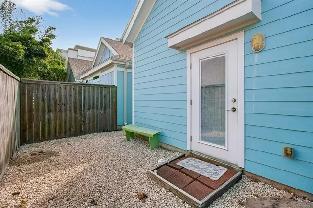 a view of a backyard with a small cabin