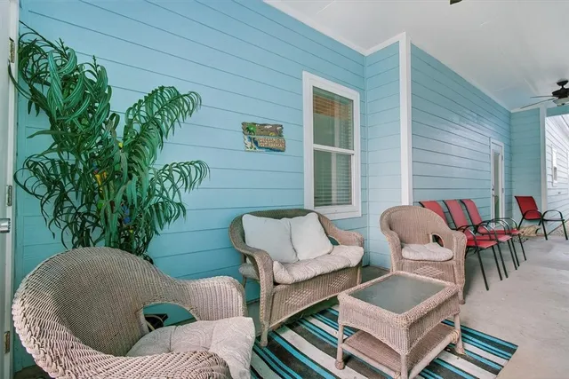 a view of a patio in the backyard
