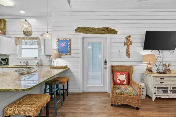 a kitchen with stainless steel appliances granite countertop a stove and a sink