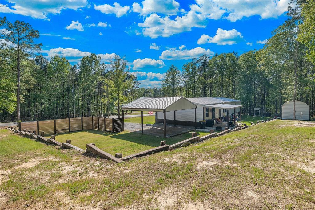 339 Cycle Plant Road Benton, LA 71006 - Photo 25 of 25 a view of a house with a backyard and tree