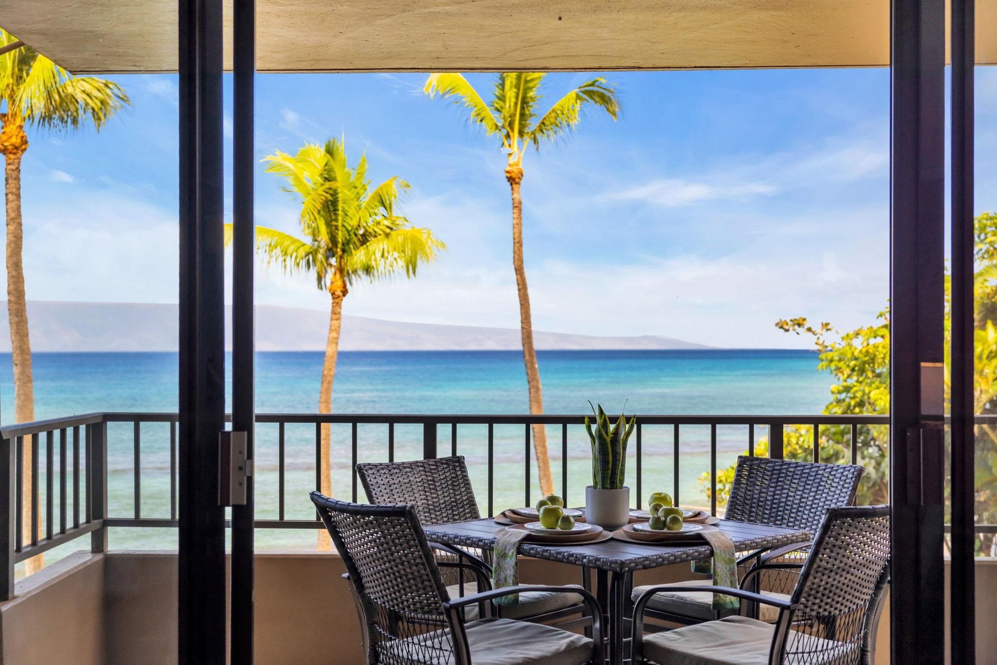 3615 Lower Honoapiilani Road, Unit 222 Lahaina, HI 96761 - Photo 1 of 50 a dining room with furniture and wooden floor