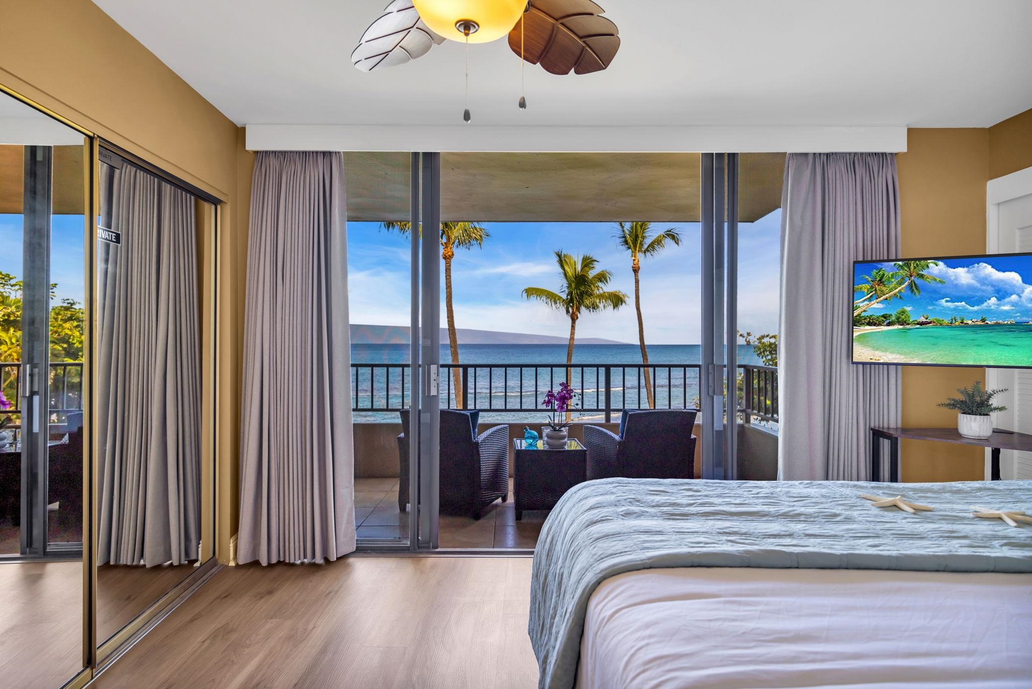 3615 Lower Honoapiilani Road, Unit 222 Lahaina, HI 96761 - Photo 25 of 50 a bed sitting in a bedroom next to a window