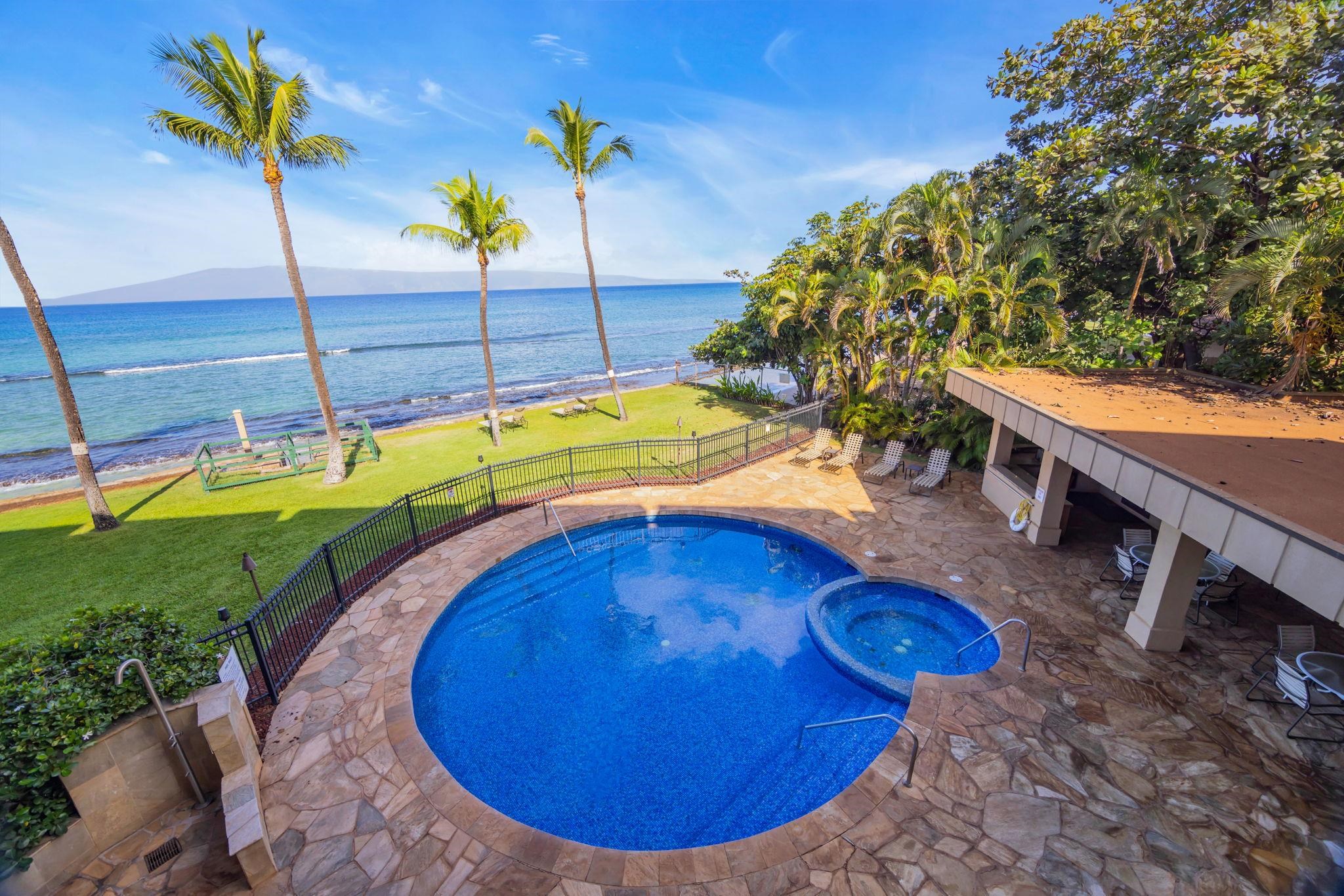 3615 Lower Honoapiilani Road, Unit 222 Lahaina, HI 96761 - Photo 35 of 50 a view of a swimming pool with a yard