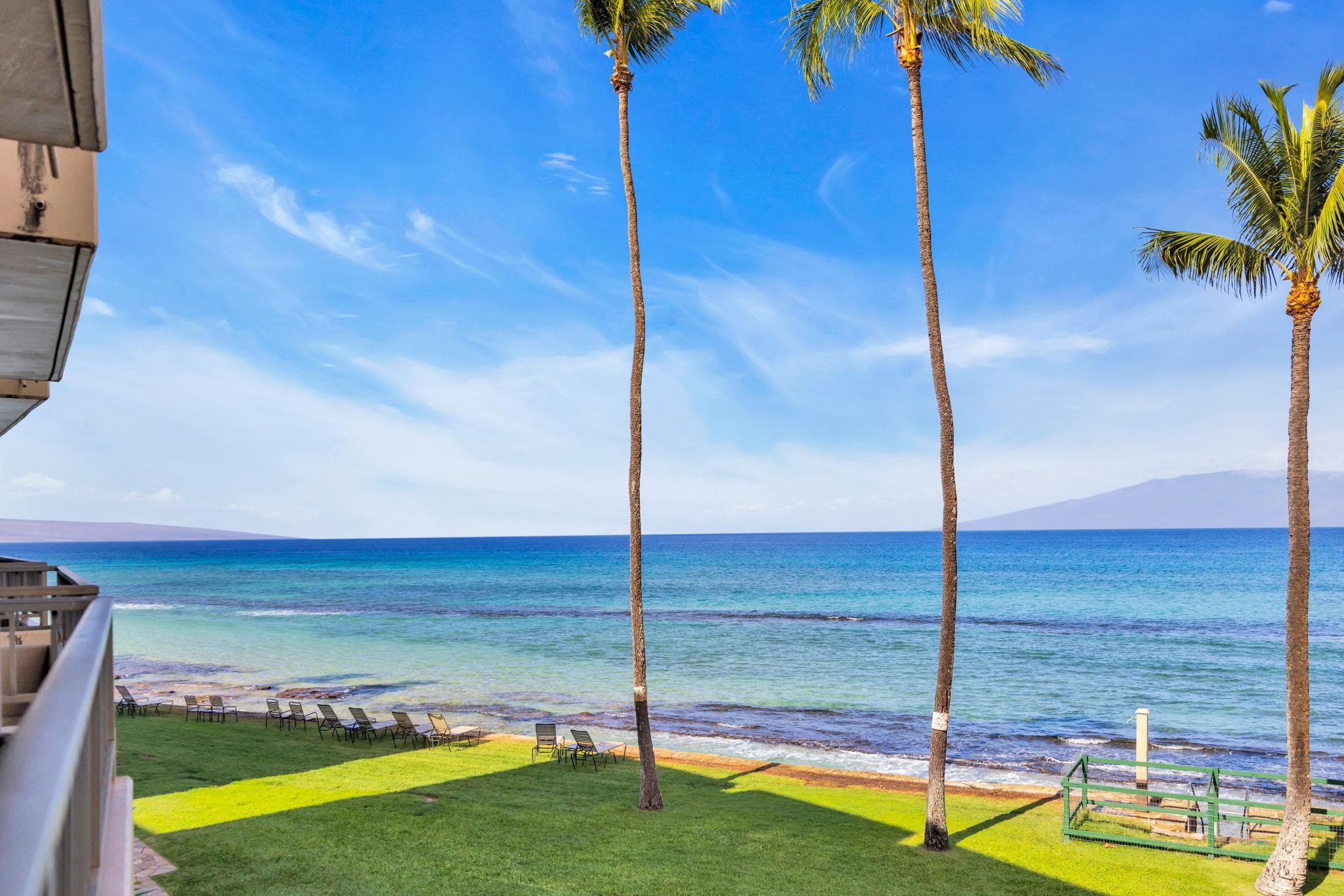 3615 Lower Honoapiilani Road, Unit 222 Lahaina, HI 96761 - Photo 38 of 50 a view of a balcony with floor to ceiling windows