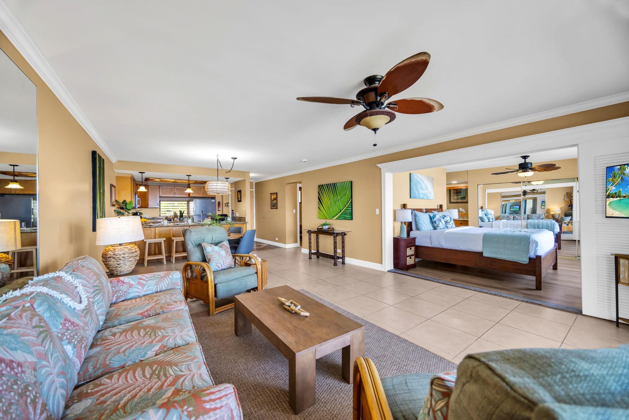3615 Lower Honoapiilani Road, Unit 222 Lahaina, HI 96761 - Photo 39 of 50 a living room with furniture and a large window